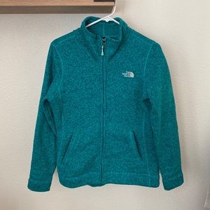 The North Face fleece zip up jacket. Women’s size M